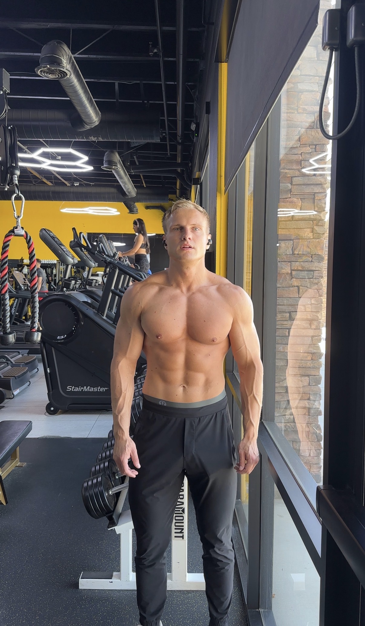 Stanislav standing in a gym during his fitness era