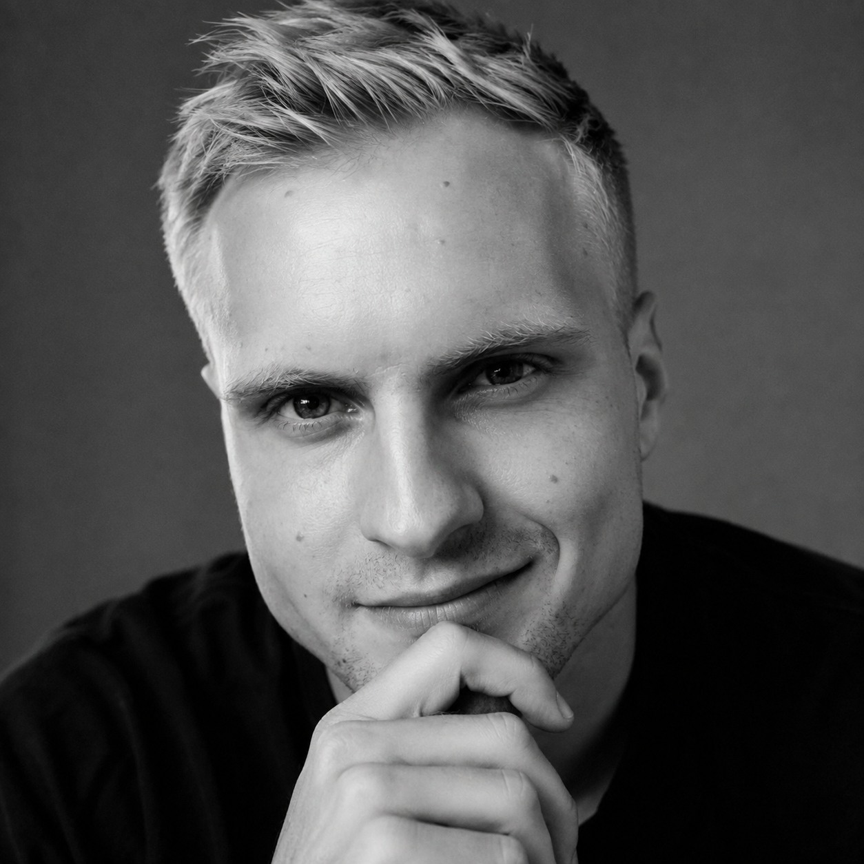 Stanislav, looking suspiciously pleased with himself.